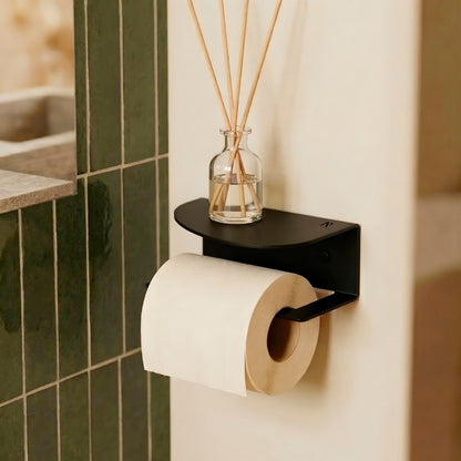 Wall-mounted toilet roll holder in powder-coated steel