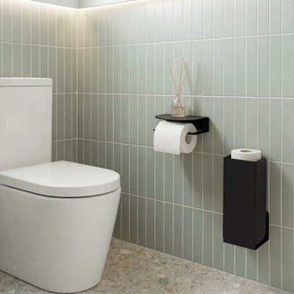 Wall-mounted toilet roll holder in powder-coated steel